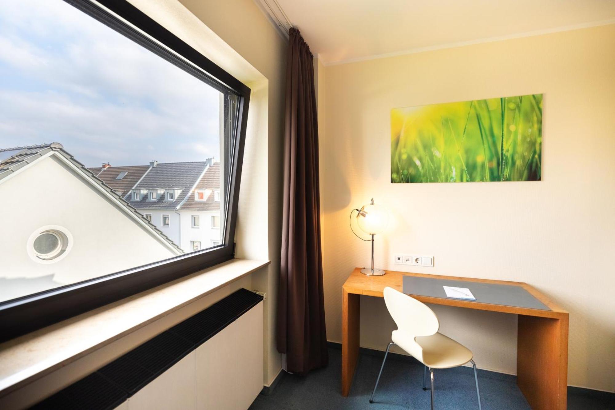Novum Hotel Silence Garden Köln Brück Exterior foto